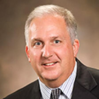Dr. J Gregg Caputo