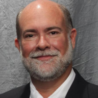 Dr. John A Miller