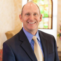 Dr. MICHAEL L ROBINSON