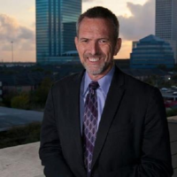 Dr. David K Dennison