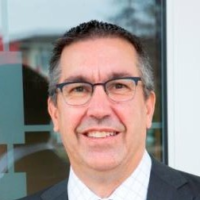 Dr. Russell J Smith