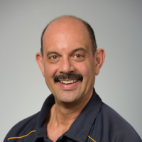 Dr. Dominic J Raymond