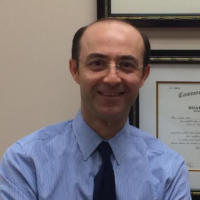 Dr. BRUCE S NOURI