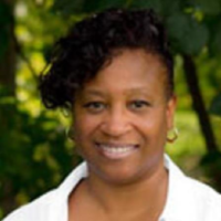 Dr. Michelle E Woods