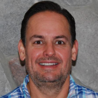 Dr. Travis Quade Harshman