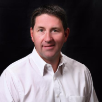 Dr. Aaron  Louscher