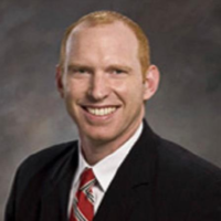 Dr. Adam M Ozment