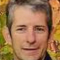 Dr. Brett K. Christensen