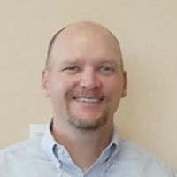 Dr. Erik  Stacey
