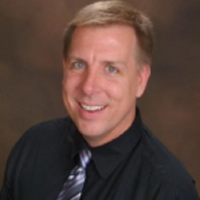 Dr. Craig A Holman