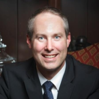 Dr. Aaron G Tucke