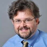 Dr. Mitchel Samuel Godat