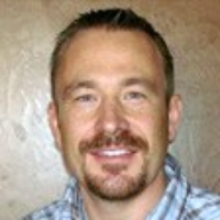 Dr. Justin S Tobias