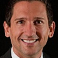 Dr. Tom J Rude