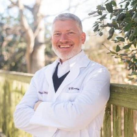 Dr. Matthew T Comiskey
