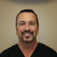Dr. Bradford J Rhodes
