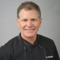Dr. Axon Darren Sholar