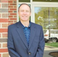 Dr. Kenneth J Benson