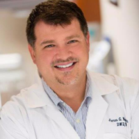 Dr. James G Woodyard