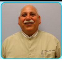 Dr. John D La Joy