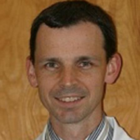 Dr. Edwin J Riley