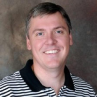 Dr. David L Brassell