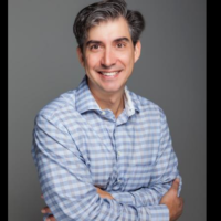 Dr. Andrew J Tringas