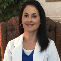 Dr. Ela Maria Torres-Moore