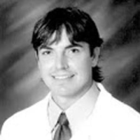Dr. Justin A Smith