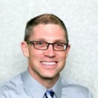 Dr. Christopher H Berkers