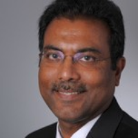 Dr. Titus  George
