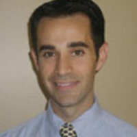 Dr. Mark  Melkonian