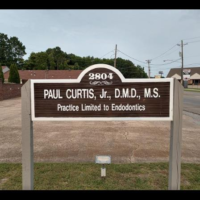 Dr. Paul M Curtis