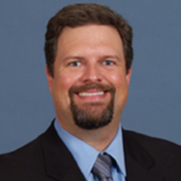 Dr. J. Andrew Andrew Baxter