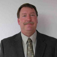 Dr. Charles F Habekost