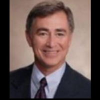 Dr. Tom H Clark