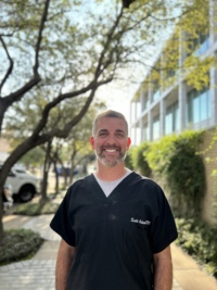 Dr. Scott A Adcock