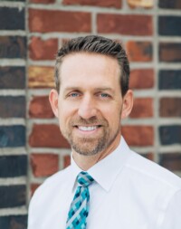 Dr. Adam D Davis