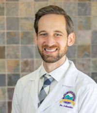 Dr. John  Schneider