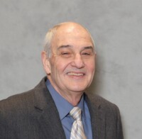 Dr. Bernard  Reusz