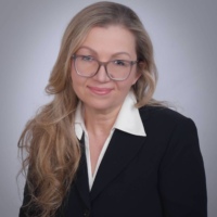 Dr. Oksana  Tsish