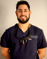 Dr. Charles K Ariza