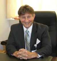 Dr. David J Miller