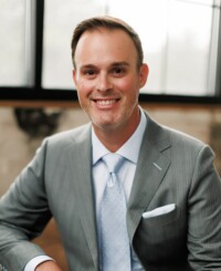 Dr. John D Triggs