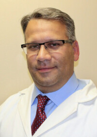 Dr. Andre T Cardoso