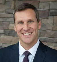 Dr. Christopher E Koehn